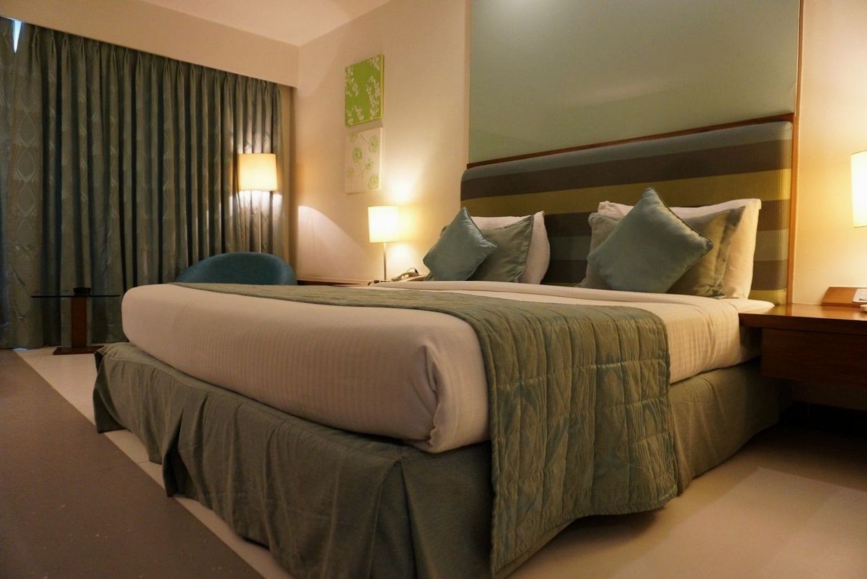 Hotel suite interior at fictional Aurora Crown Resort